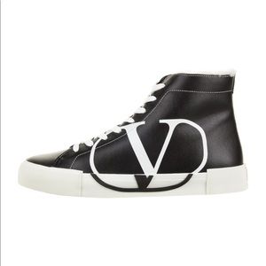 SOLD! Valentino leather shearling lined high top